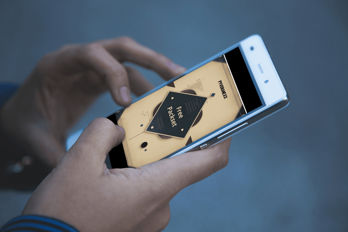Person holding a smartphone with a wooden case on a blurred background