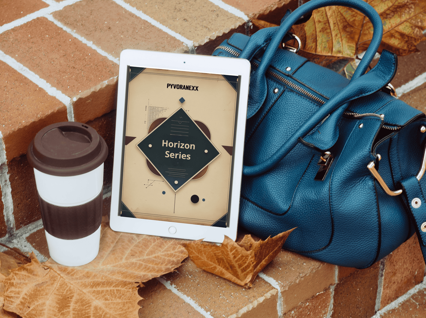Blue handbag with a tablet displaying 'Pyvoranexx Horizon Series' and a coffee cup on a brick surface.