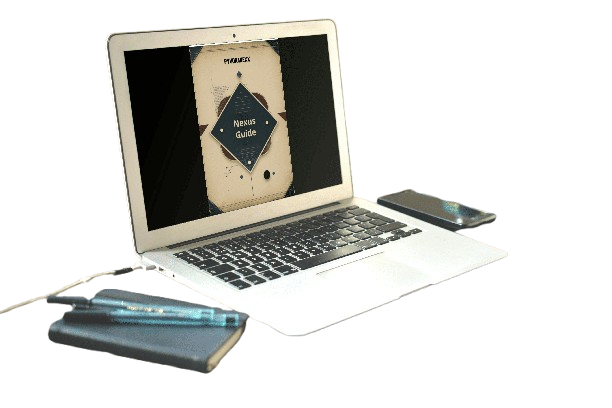 Laptop with a book on screen, pen, notebook, and phone on a white background